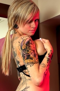 Big boobed girl with tattoos