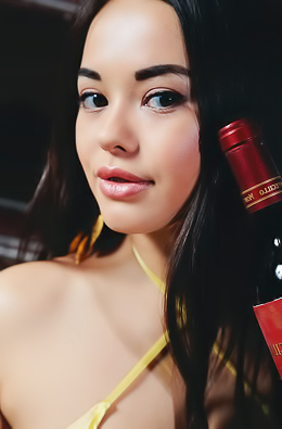 Li Moon Relaxing in the nude sipping some good wine