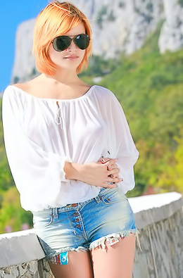 Violla A - Red-haired cutie caresses pussy outdoors