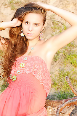 Cute Nensi with long red hair gets nude outdoors