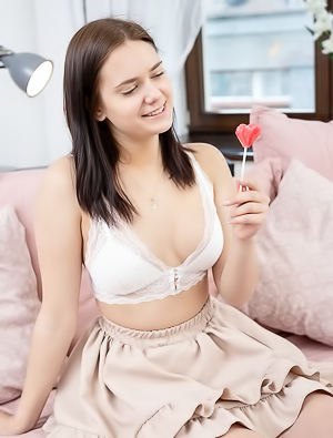 Tina Howl Flirty Look In Her Gorgeous Blue Eyes As She Sucks Her Lollipop