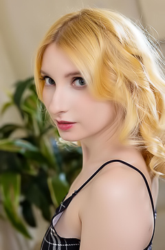 Minnie Lighter Squeezing Her Gorgeous Breasts And Smiles Seductively