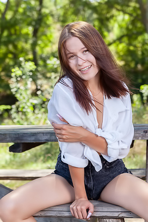 Skye Bloom Perching On A Picnic Table In The Park