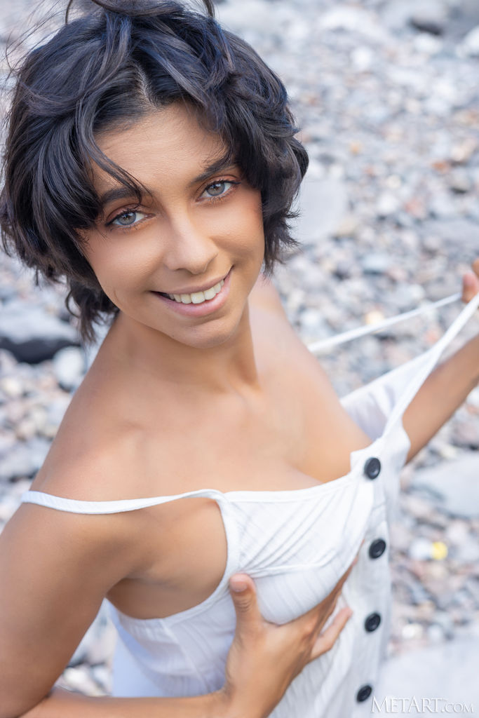 Kensi Teases With Button Dress Flashing Boobs Under Italian Sun