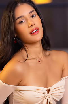 Carolina Guerrero Seduces In Her Bedroom Wearing Denim Shorts And A White Top Whispering Temptation