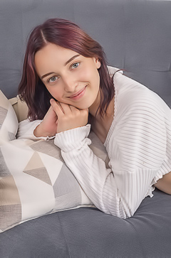 Aruna Plays Dildo in Mini Skirt on Couch