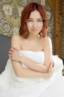 Rosalind Parts Her Slender Thighs To Frame Her Shaved Pussy