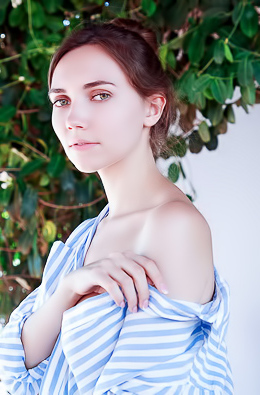 Danniela Unbuttoning Her Striped Shirt To Reveal Her Perfect Breasts