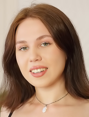 Kris Si Spreading The Succulent Pink Folds Of Her Shaved Pussy With Both Hands