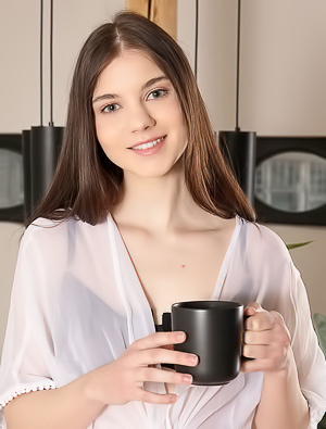 Sara Celeste Captivating Ukrainian Beauty Sweeps Her Shiny Brunette Hair