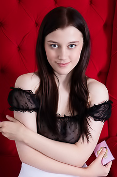 Enid Teases With An Upskirt Glimpse Of Her Plump Lips While Bending Over In Lace