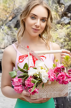 Oxana Chic Shows Off In Crop Top Gathering Flowers, Teasing View Under Shorts