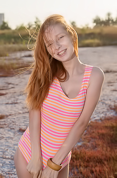 Olivia I Explores The Sensual Texture of Silk in Her Camisole and Denim Shorts Under The Sun